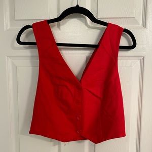 Vibrant red crop top vest, perfect with high rise bottoms